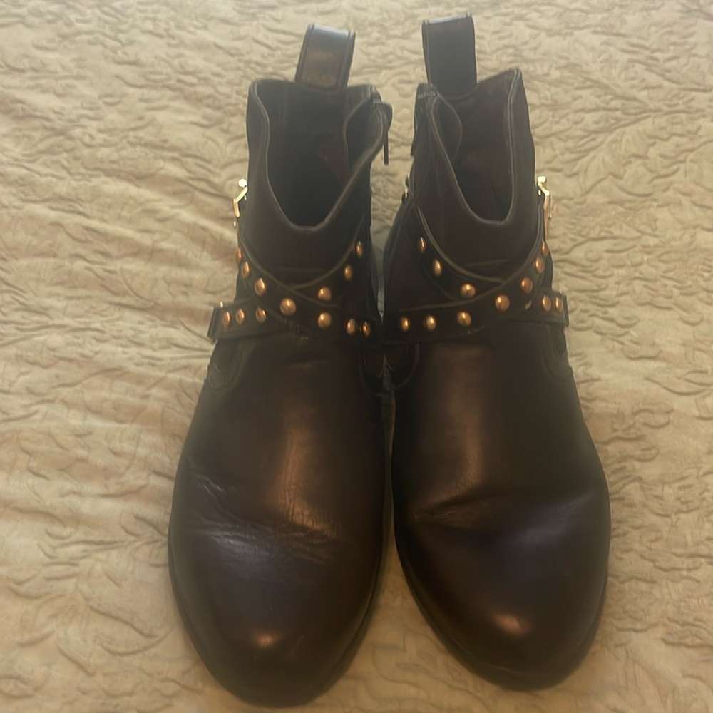 Black leather booties by Naot